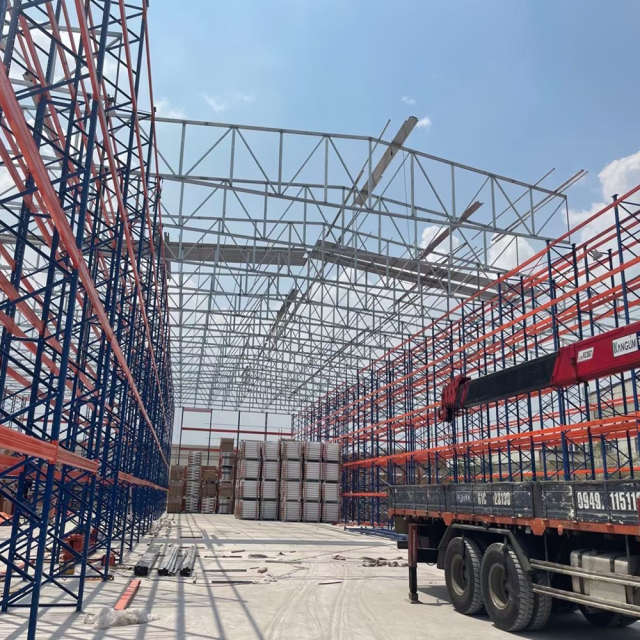 Non- Automated Rack Clad Warehouse Building Structure System